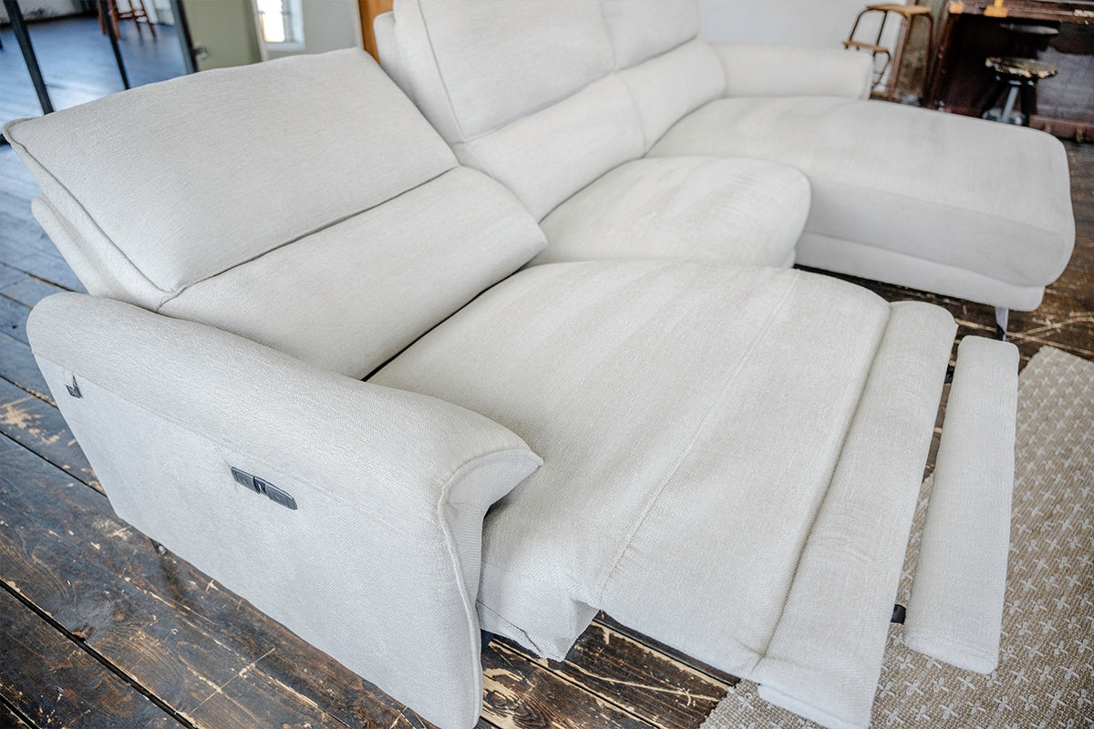 KAWOLA Sofa ADRIANA Ecksofa mit Relaxfunktion Stoff hellgrau