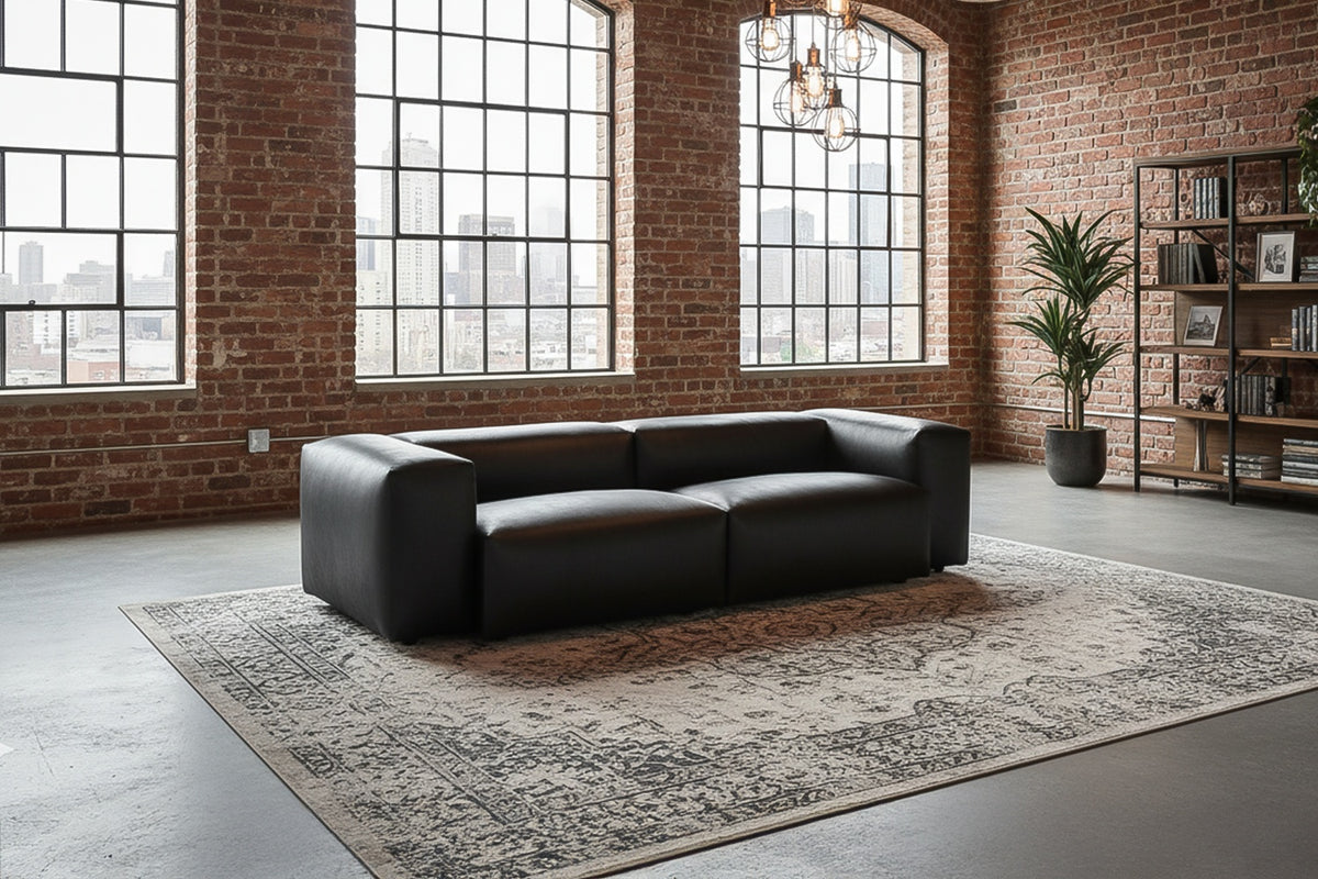 KAWOLA Sofa CELESTE 4-Sitzer mit Hocker Lederfaserstoff schwarz