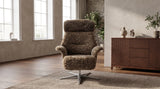 KAWOLA Sessel TOSAR Relaxsessel drehbar Schaffell grau mit Hocker