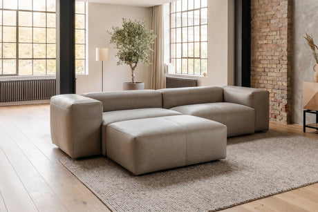 KAWOLA Sofa CELESTE 4-Sitzer Leder grau, Mit Fußhocker