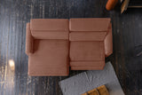 KAWOLA Sofa LAISKA Ecksofa Relaxfunktion teilmotorisch Cord rost